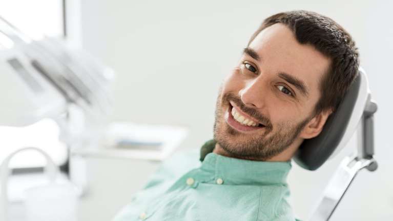 patient with a dental bridge middletown