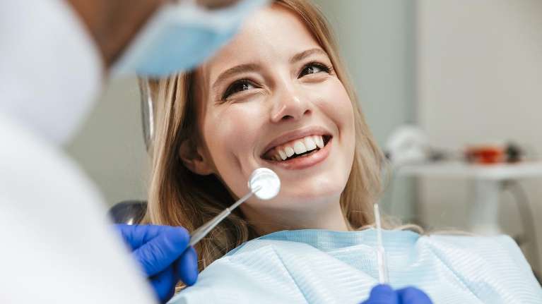 Patient undergoing dental examniation in Middletown, NJ