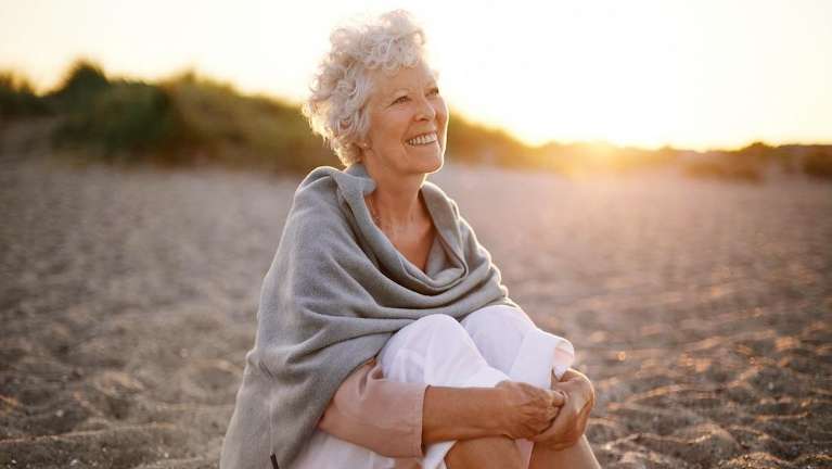 implant-retained dentures middletown | woman smiling