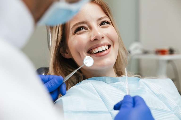 dental implants middletown | patient at dentist
