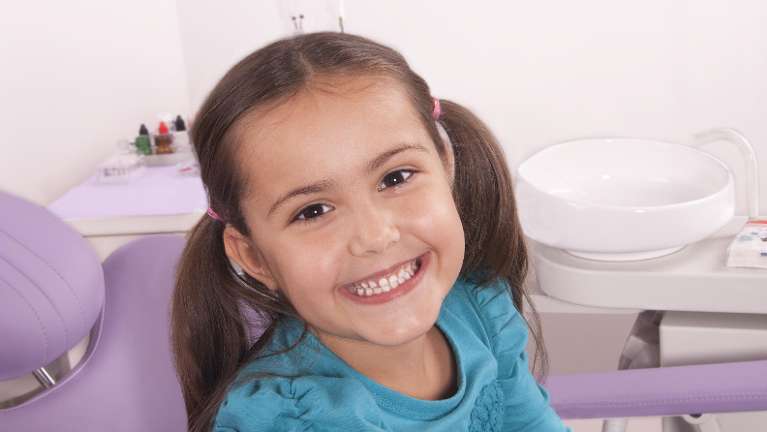Child smiling after dental check up at Middletown, NJ