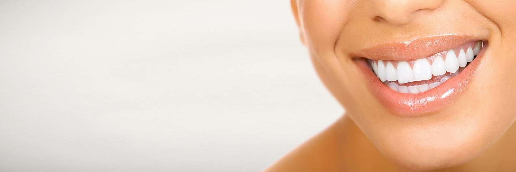 Lady smiling after cosmetic dentistry in Middletown,NJ
